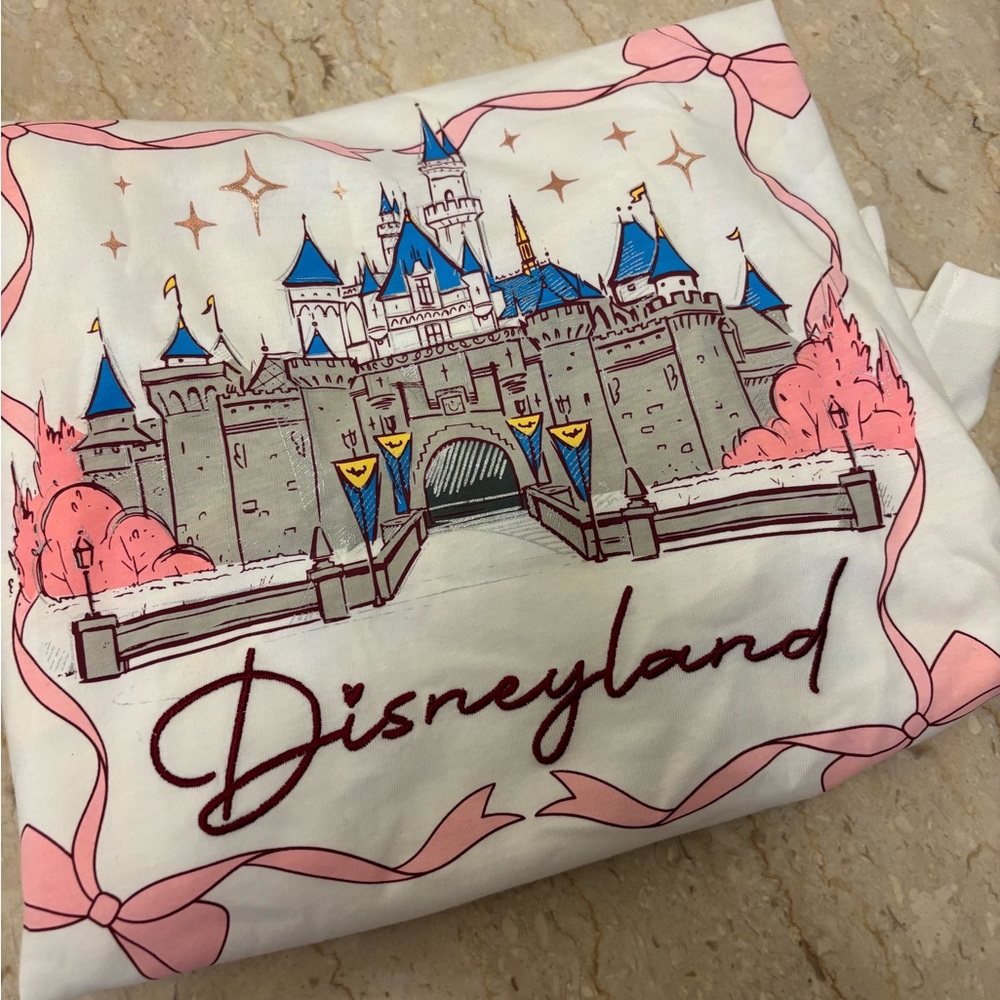 NWT Disney Parks 2025 Disneyland Castle with Bows and Ribbon White Graphic Tee